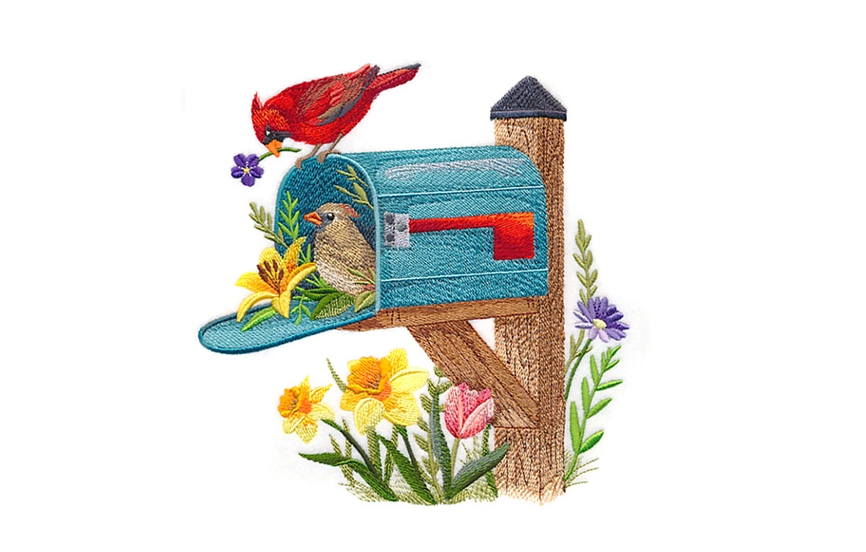 Mailbox with birds and flowers all around